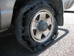 flat_tire-707054.jpg