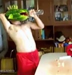 1319650698_drunk_puking_fish_melon_head.jpg