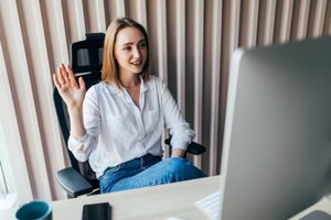 young-pretty-woman-having-video-call-via-laptop.jpg