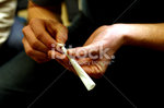 istockphoto_408997_rolling_a_joint.jpg